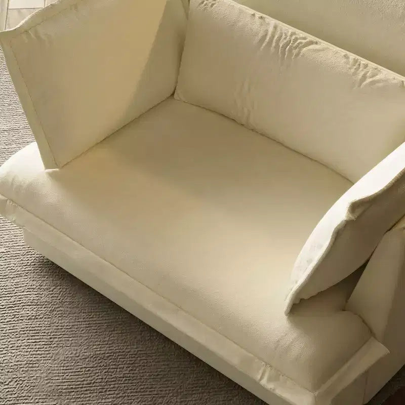 Fauteuil simple blanc capitonné, mobilier de salon confortable