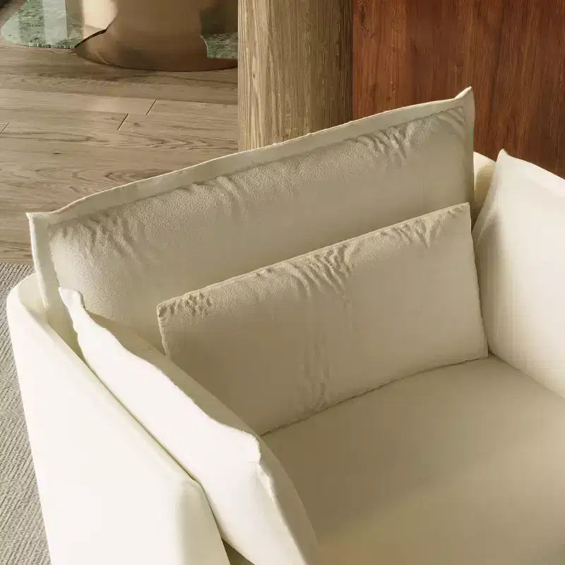Fauteuil simple blanc capitonné, mobilier de salon confortable
