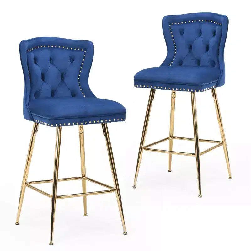 Tabourets de bar en velours, hauteur comptoir, avec pieds en métal et capitonnage.